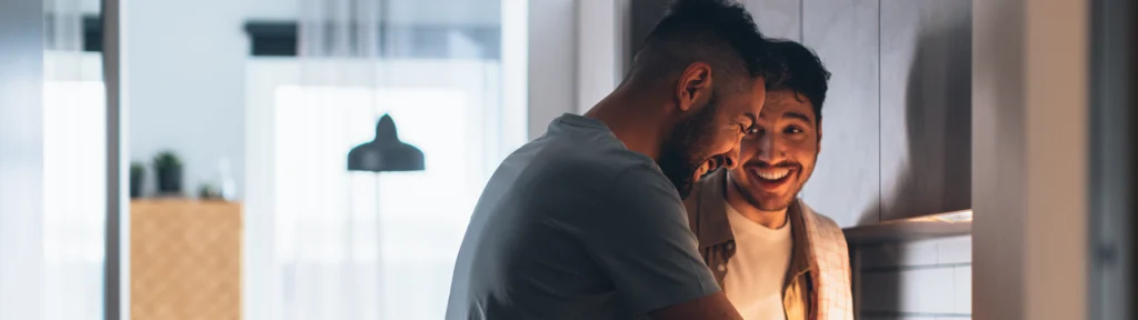 Young Couple Cooking in Kitchen
