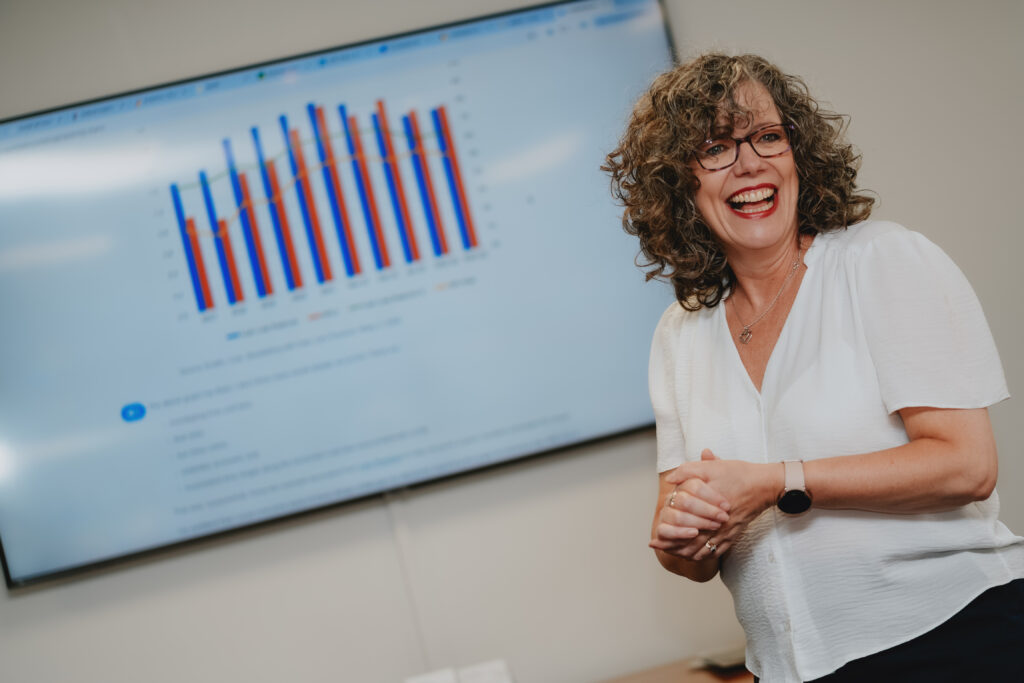Woman in finance presenting a chart